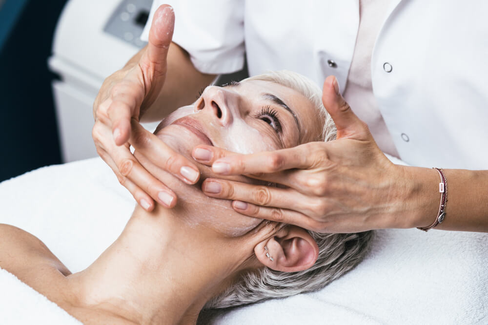 woman being exfoliated